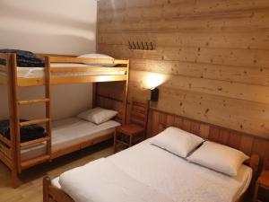 Postel nebo postele na pokoji v ubytování Appartements Le Clos des Gentianes + 74 fotografií