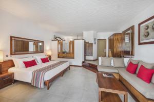 Гостиная зона в Shandrani Beachcomber Resort & Spa