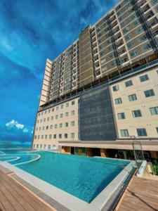 Bazén v ubytování Uma Hotel and Residences nebo v jeho okolí