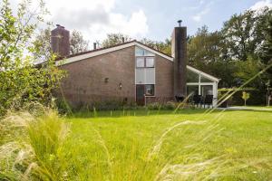 Κήπος έξω από το Grasmus I Kalme Woning met Openhaard en Tuin +48 φωτογραφίες