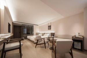 Posezení v ubytování Walling Hotel - Chongqing hongyadong jialingjiang binjianglu