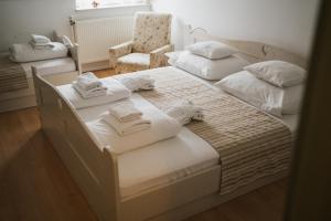 Posteľ alebo postele v izbe v ubytovaní Tornácos Hotel - Hegykő