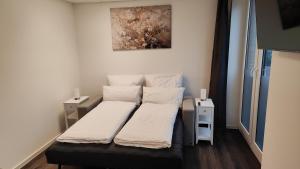 Ένα ή περισσότερα κρεβάτια σε δωμάτιο στο FEEL - Comfort Prinzipal Münster