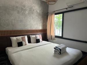 Postel nebo postele na pokoji v ubytování Costa Bed Hua Hin