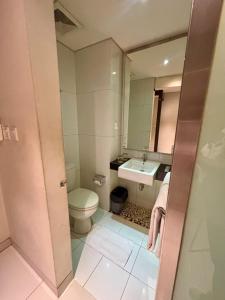 Koupelna v ubytování V Hotel Tebet