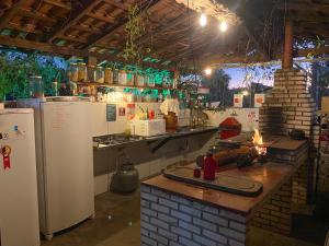 Kuchyň nebo kuchyňský kout v ubytování CAMPING em Alto Paraíso de Goias