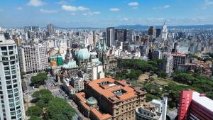 an aerial view of a city with tall buildings at TrevizZo Catedral da Sé in São Paulo