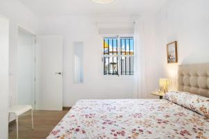 Ένα ή περισσότερα κρεβάτια σε δωμάτιο στο Apartamento Atalaya
