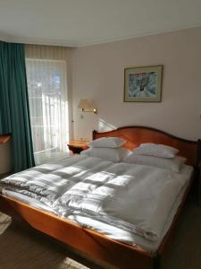 Posteľ alebo postele v izbe v ubytovaní Appartements Lüftenegger
