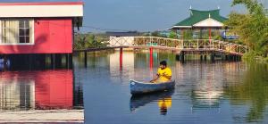 a man in a small boat in the water at Bell Farms and Resorts in Munroe Island