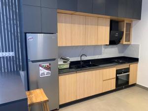 Una cocina o cocineta en Résidence Maëlle fijdrossè togbin