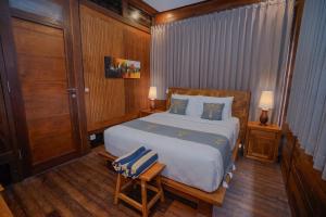Moin Villa Lembongan客房内的一张或多张床位