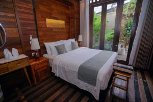 Moin Villa Lembongan客房内的一张或多张床位
