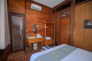 Moin Villa Lembongan客房内的一张或多张床位