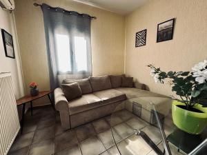 Posezení v ubytování Cozy Apartments Mc Queen