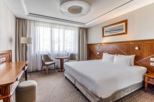 Hotel Haffner Resort & Spa - Destigo Hotels客房内的一张或多张床位