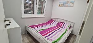 Posteľ alebo postele v izbe v ubytovaní Picurka Apartman