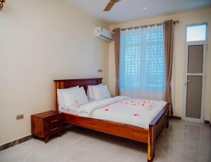 Ένα ή περισσότερα κρεβάτια σε δωμάτιο στο Ais apartments +76 φωτογραφίες
