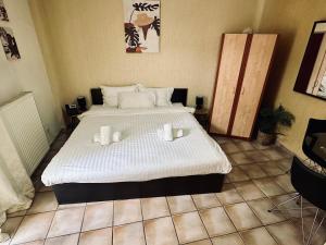 Postel nebo postele na pokoji v ubytování Cozy Apartments Mc Queen