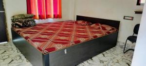 Postel nebo postele na pokoji v ubytování Baidyanath Ashram Non AC ठहरने का उत्तम प्रबंध