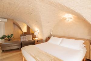 Postel nebo postele na pokoji v ubytování Suite Mameli Ostuni