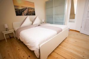 Postel nebo postele na pokoji v ubytování Haus Steffchen - Gemütliche Auszeit nahe der Ostsee