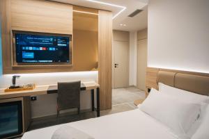 Voodi või voodid majutusasutuse Hotel Flamingo 1 toas