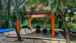 Taman di luar Pousada Fazendinha Tatuira