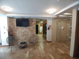 TV a/nebo společenská místnost v ubytování Intimo Spa Grza