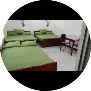 Postel nebo postele na pokoji v ubytování Dinesh holidy resort