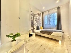 Photo de la galerie de l'établissement Villa Vieux Lille access, proche gare, parking Offert, à Mons-en-Baroeul