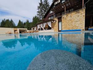 Bazén v ubytování Intimo Spa Grza nebo v jeho okolí