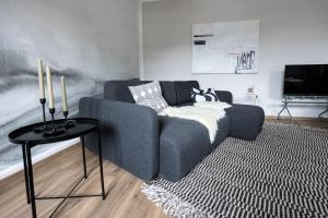 Χώρος καθιστικού στο Haus Engelhardt Design Wohnung Heidi mit Burgblick