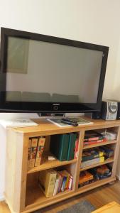 TV a/nebo společenská místnost v ubytování Kärtnerisch Wohnen