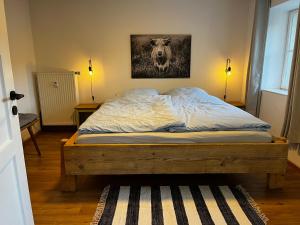 Postel nebo postele na pokoji v ubytování Ferienwohnung Gartenglück