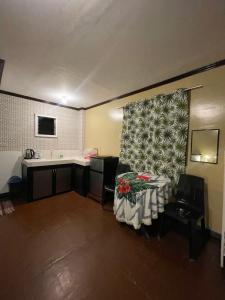 Η κουζίνα ή μικρή κουζίνα στο Seascape at Top Sea Can Siargao