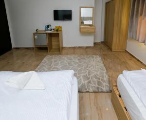 Voodi või voodid majutusasutuse Pyramids Express View Hotel toas