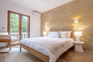 Postel nebo postele na pokoji v ubytování Casa Higo + 42 fotografií