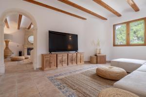 TV a/nebo společenská místnost v ubytování Casa Higo