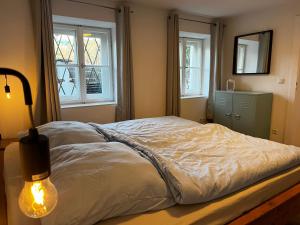Postel nebo postele na pokoji v ubytování Ferienwohnung Gartenglück