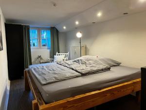 Postel nebo postele na pokoji v ubytování Ferienwohnung Gartenglück