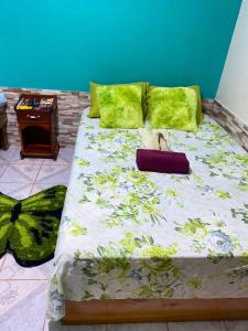 Кровать или кровати в номере Cabinas Mitchaelle's