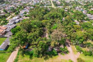 an aerial view of a neighborhood with trees at Pousada Fazendinha Tatuira in Imbé +137 photos