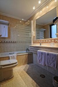 Koupelna v ubytování Hotel Alisi
