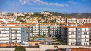 an aerial view of buildings in a city at Quintas Village AY by Atlantic Holiday in Caniço