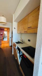 A kitchen or kitchenette at Ski-in and out in Thyon 2000