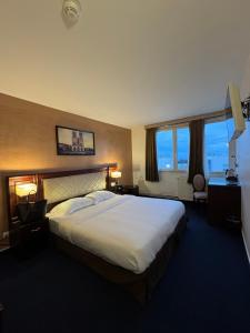 Katil atau katil-katil dalam bilik di Hotel Grand Paris