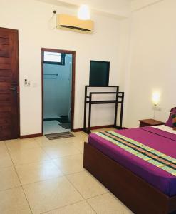 Et tv og/eller underholdning på Aqua Marine Beach Hotel