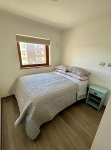 เตียงในห้องที่ Exclusivo Departamento Equipado Estacionamiento Privado 2D-2B con Excelente ubicación en Los Ángeles