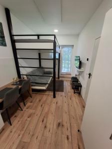 Postel nebo postele na pokoji v ubytování apartma Pohorc - Praprot